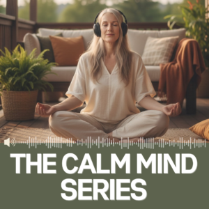 Woman with headphones on in cross-legged meditation pose on floor