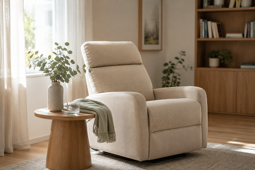 Comfortable beige therapy chair in a calm, sunlit counselling room with plants and warm natural decor.